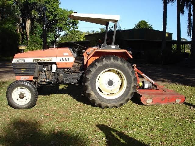 Farmland 2WD Tractor and Jarrett Slasher Farm Machinery sales NSW